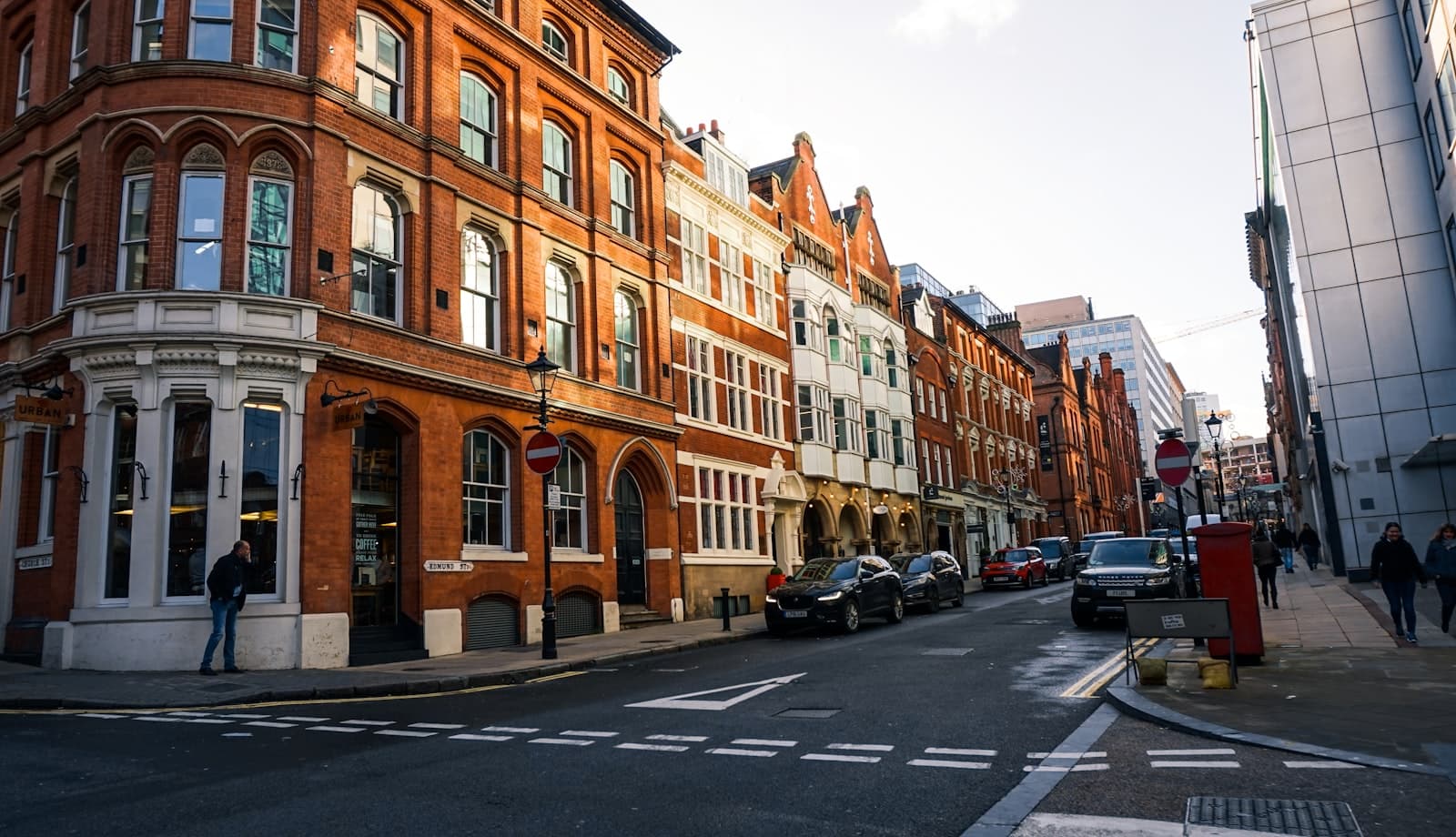 Cars parked outside a brick building in Birmingham